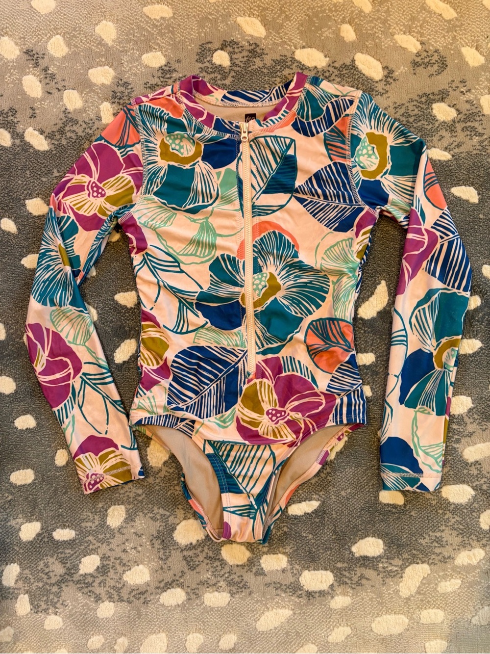 Tea Collection Floral Long-Sleeve Rashguard Swimsuit in Teal, Purple & Pink